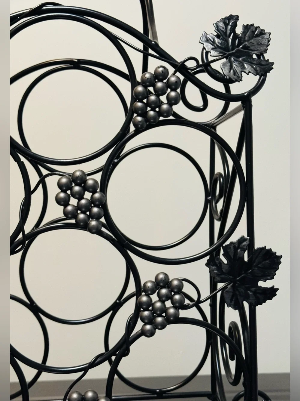 Black Metal Vintage Wine Rack with Silver Grape Accents